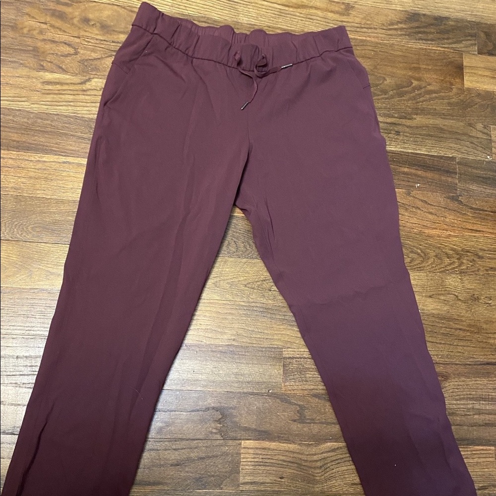 Lululemon Keep Moving Pant High-Rise, Size 14 Tall. Burgundy in color